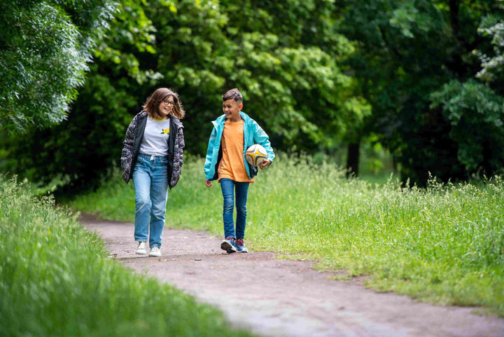 Children walking in park 